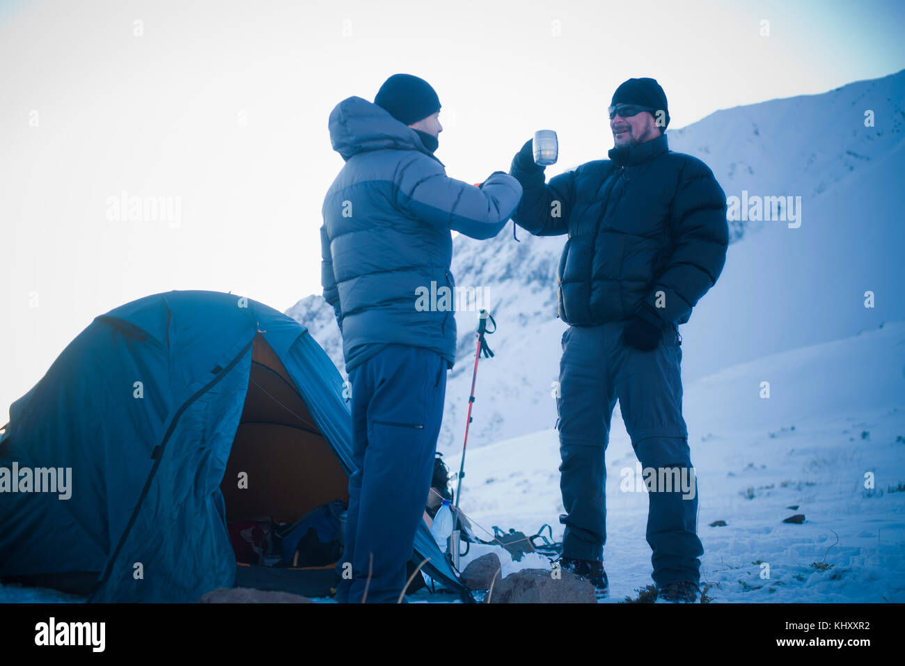 Men camping in Los Andes mountain range, Santiago, Chile Stock Photo