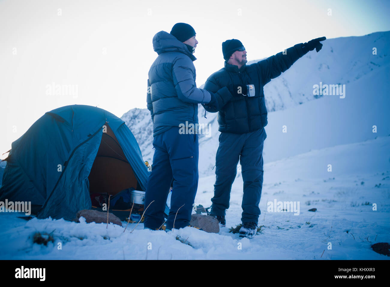 Men camping in Los Andes mountain range, Santiago, Chile Stock Photo