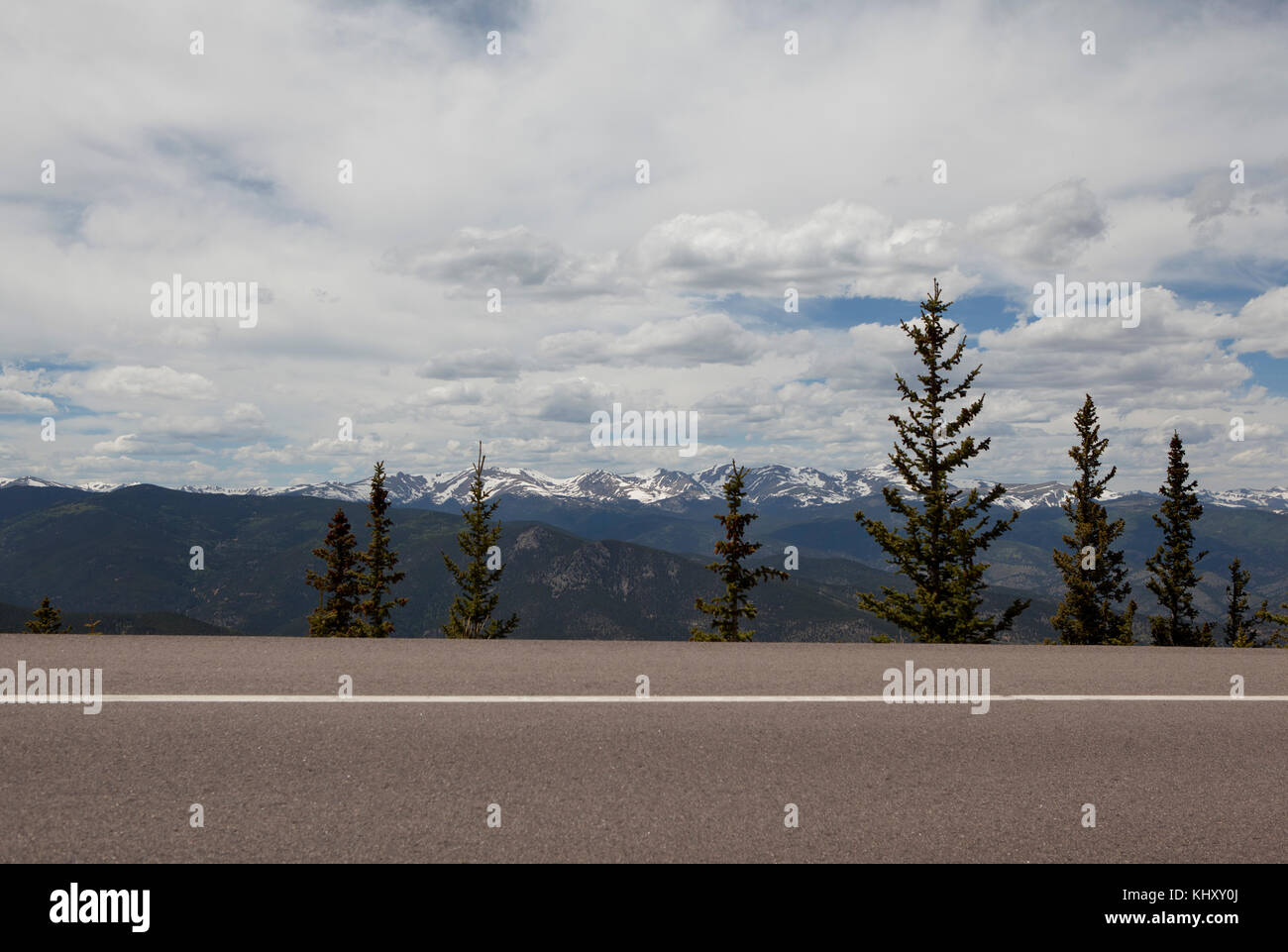 Squaw Pass highway and distant mountains, Evergreen, Colorado, USA Stock Photo
