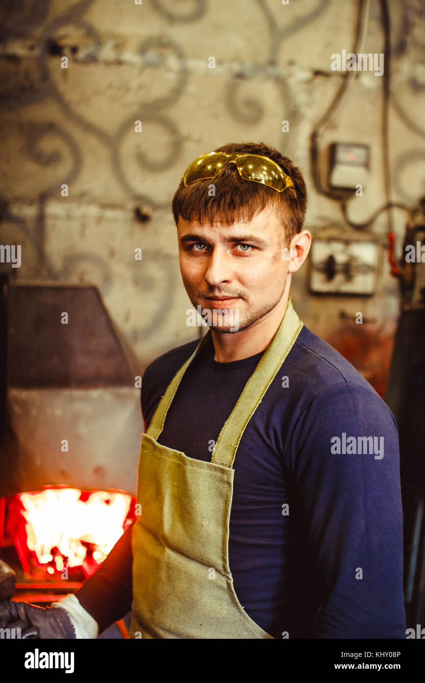 two are in working clothes in the Stock Photo Alamy