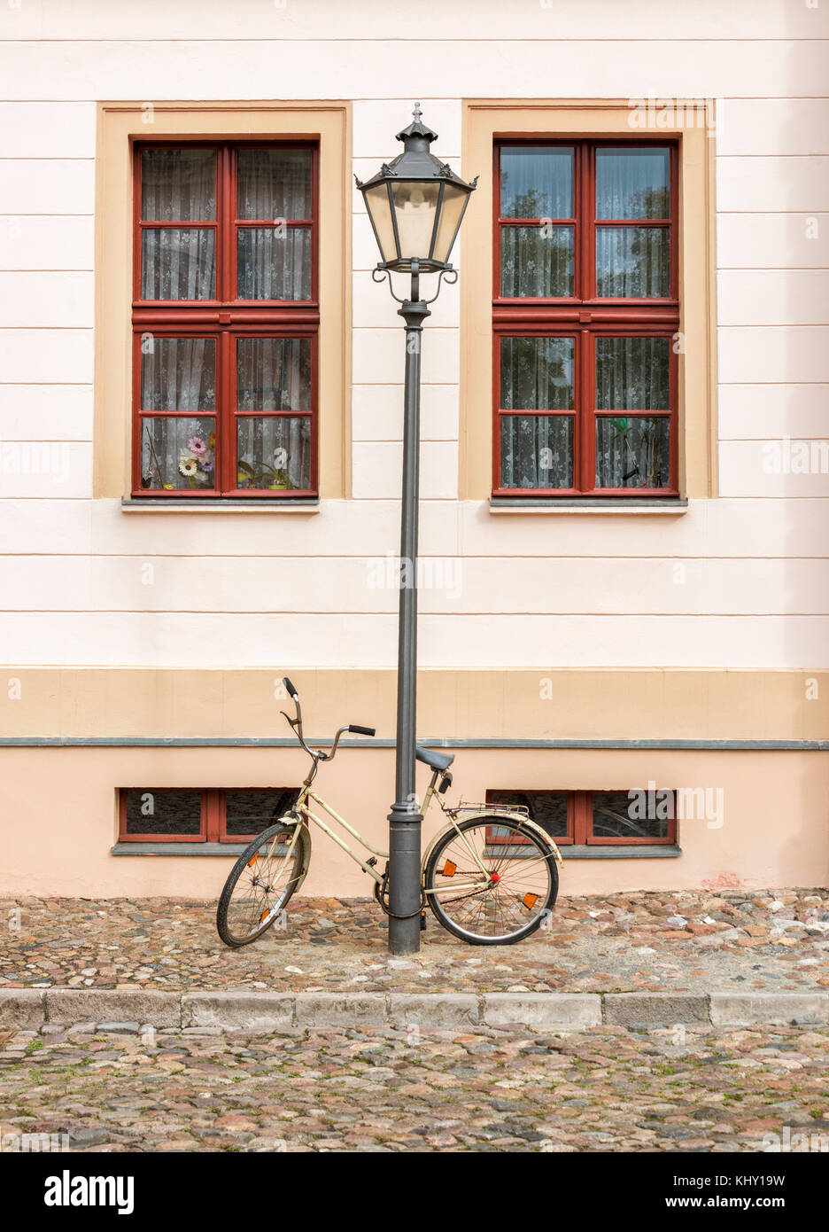 bicycle chained to a lampost on a german street Stock Photo