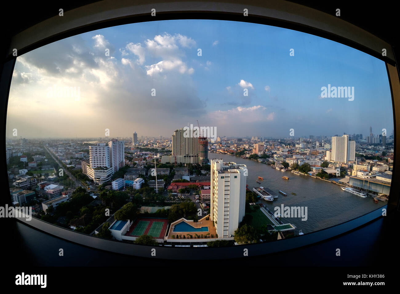 Looking north along the Chao Phraya river in Bangkok, Thailand. Stock Photo