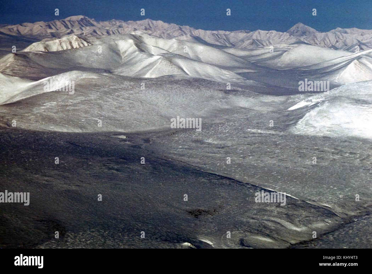 Aerial view of snowy mountain peaks winter Stock Photo - Alamy