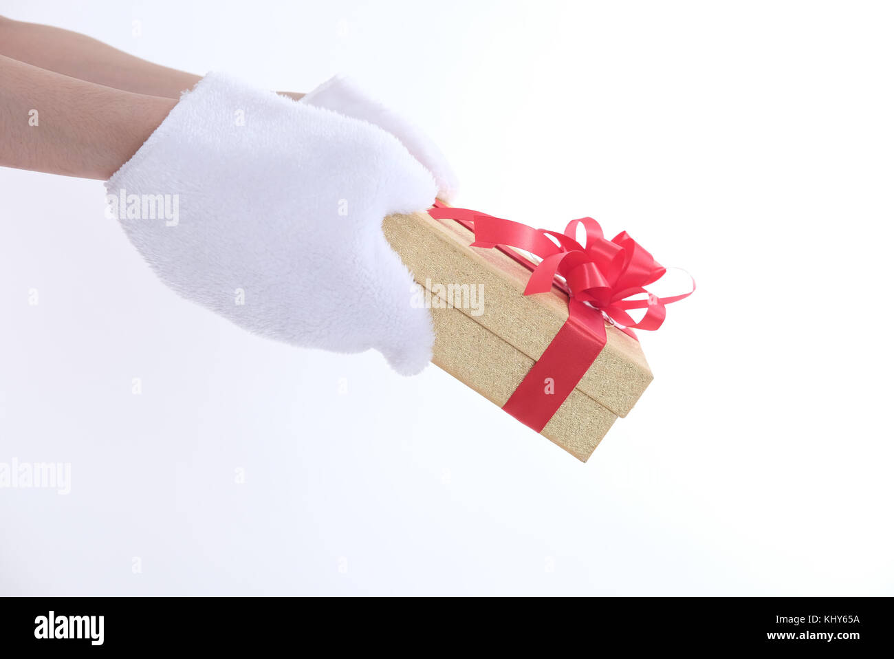 hand wearing white glove holding gift present box. christmas holiday