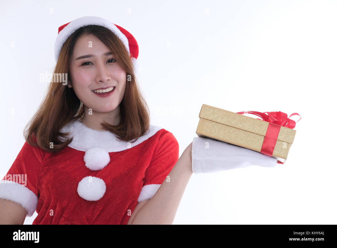 portrait of asian woman in santa claus dress on white background. girl ...