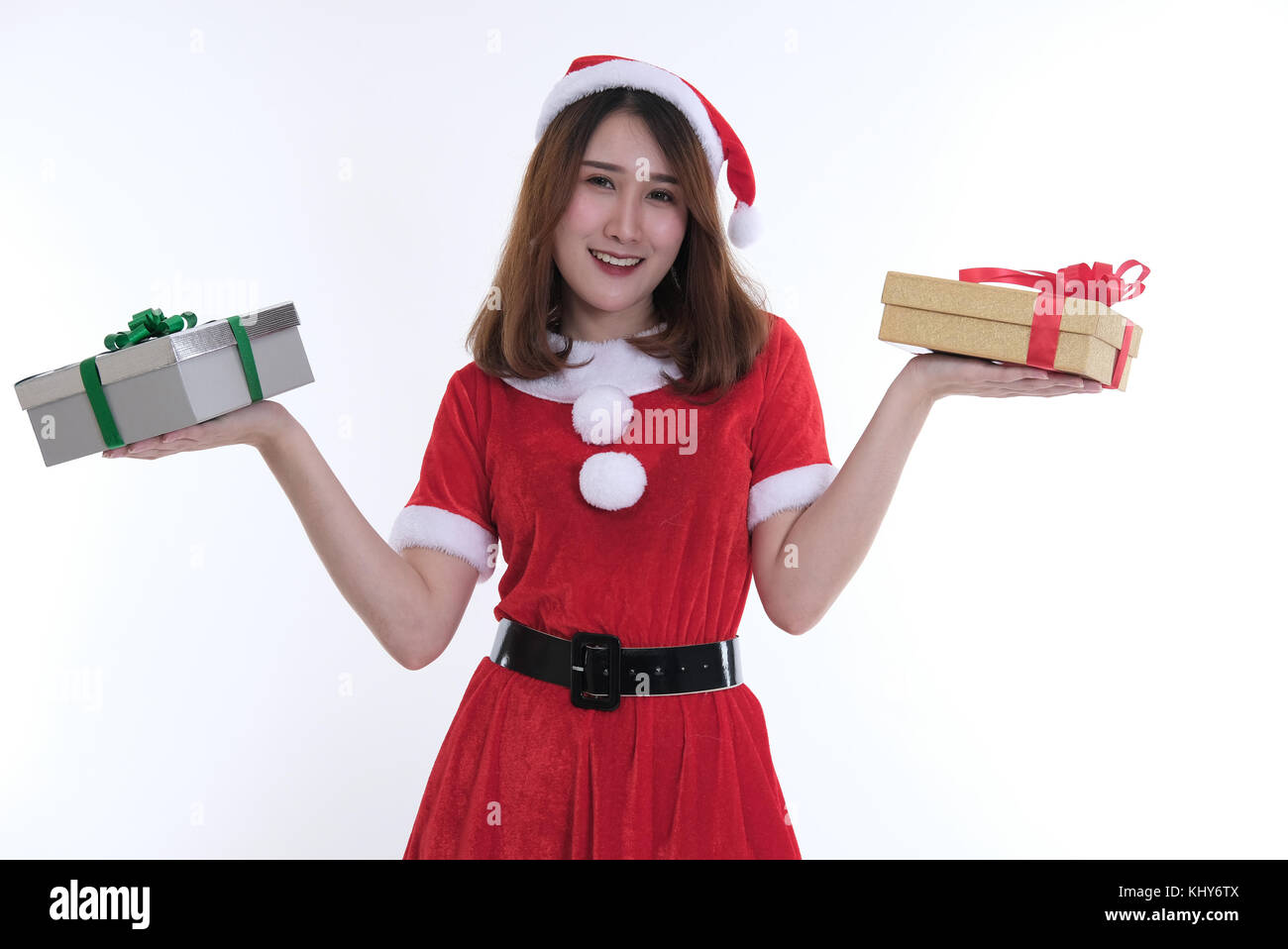 portrait of asian woman in santa claus dress on white background. girl ...