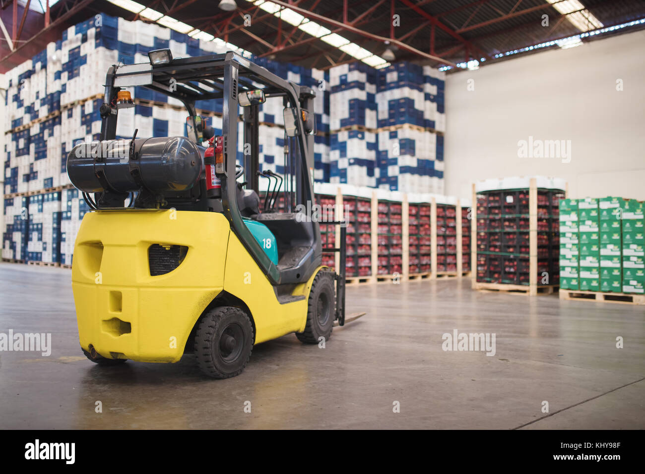 Large modern warehouse with forklift Stock Photo