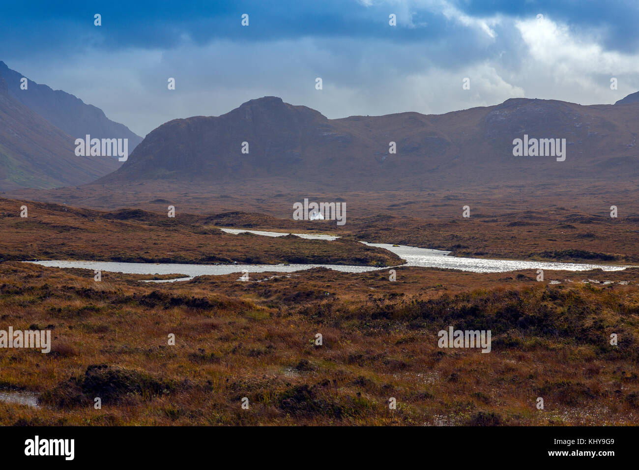 The lonely Alltdearg House sits on the moors at the base of the Black Cuillin hills near Sligachan, Isle of Skye, Scotland, UK Stock Photo