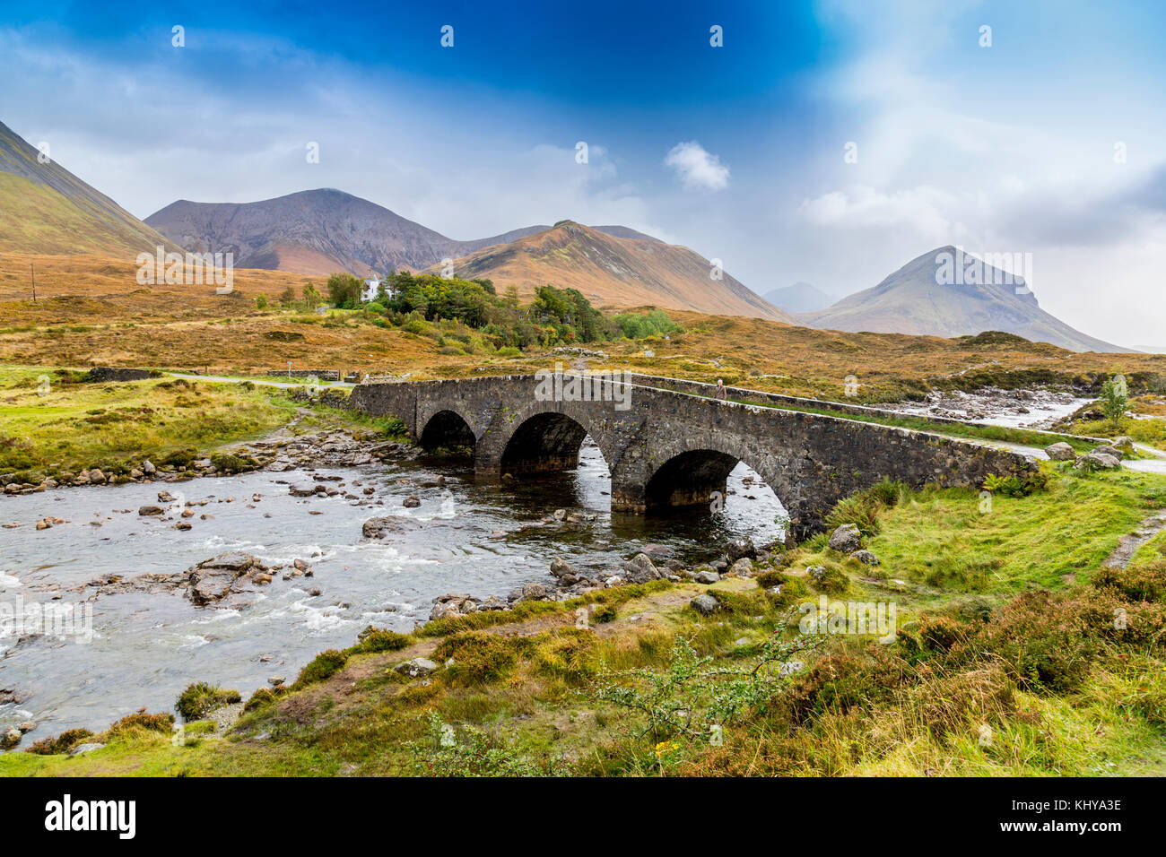An old road bridge over the River Sligachan and the lonely Red Cuillin hills near Sligachan, Isle of Skye, Scotland, UK Stock Photo