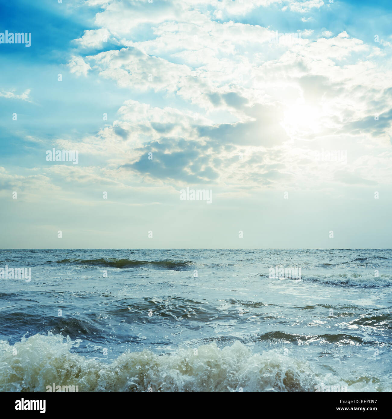 low dramatic clouds in sunset over sea Stock Photo - Alamy