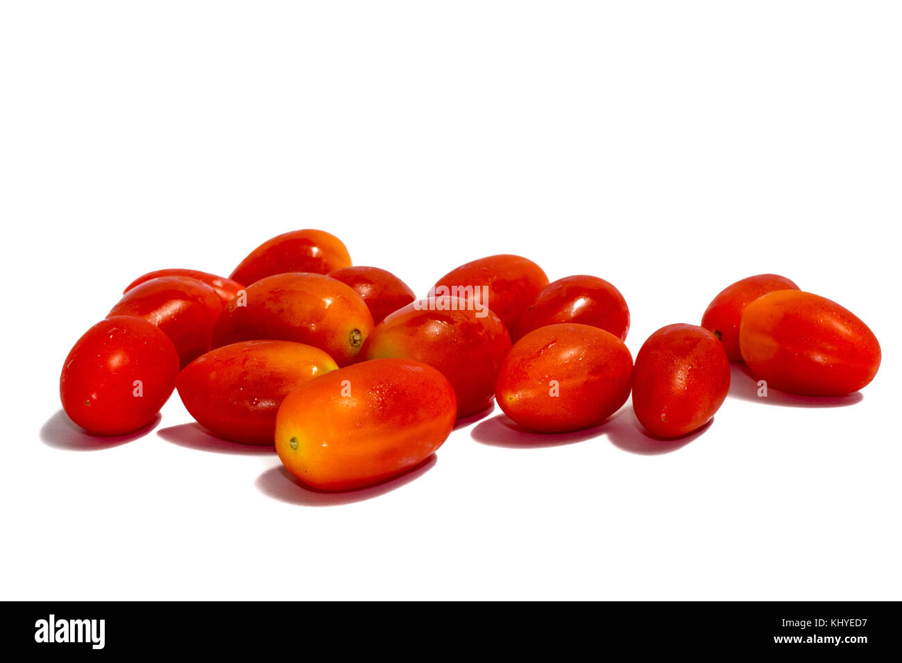 Plum tomatoes isolated on white background Stock Photo - Alamy
