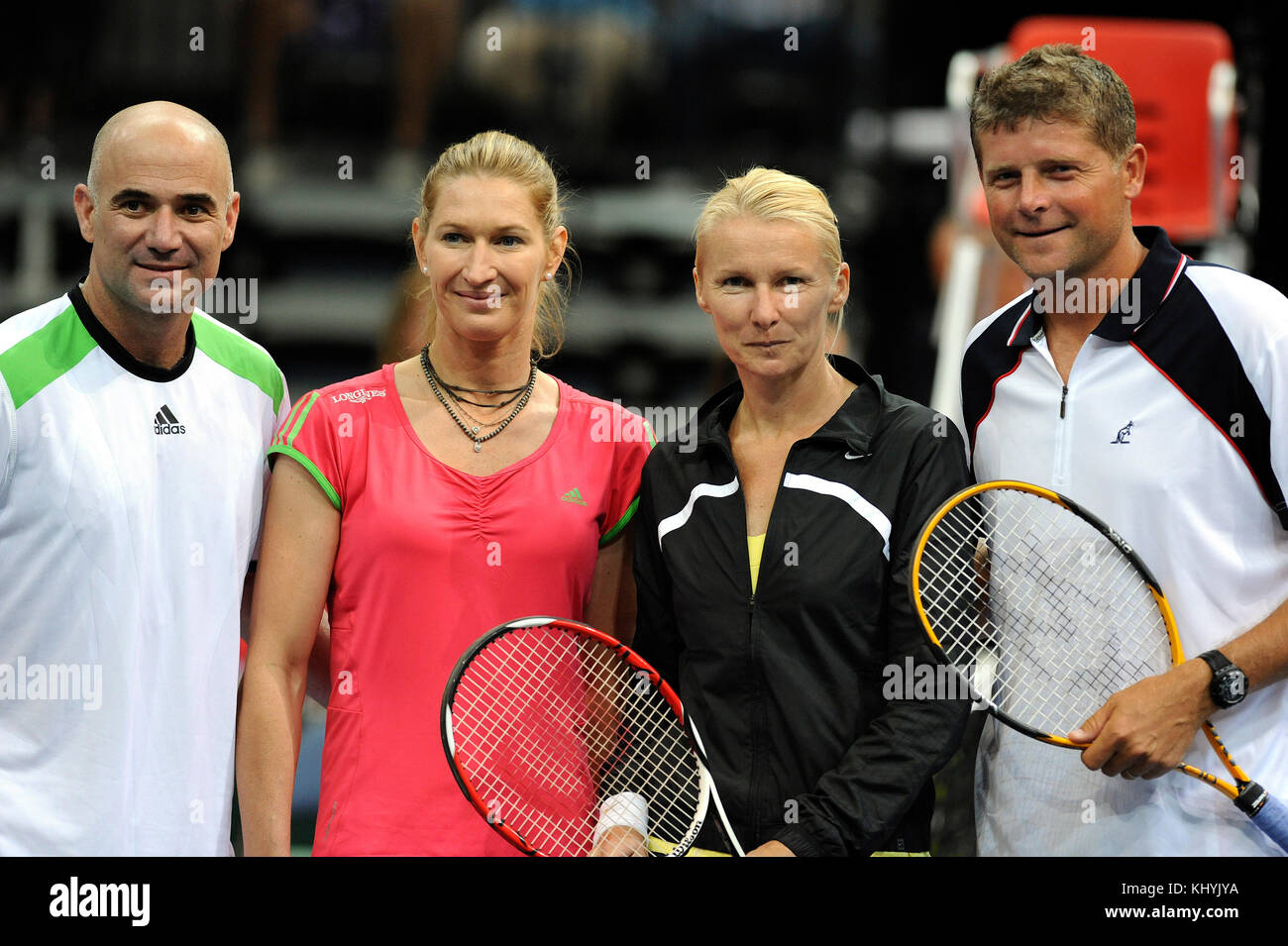 FILE PHOTO FROM June 7 2011 From left: Andre Agassi of USA, German Steffi Graf, Jana Novotna and Jiri Novak of Czech Republic pose to photographers during the exhibition tournament Advantage Tennis IV in Prague, June 7, 2011. Czech tennis player Jana Novotna, winner of Wimbledon, died after a serious illness on Sunday, November 19, 2017 at the age of 49 years. She won the women's singles title at Wimbledon in 1998. She worked as a tennis coach in the past years. (CTK Photo/Katerina Sulova) Stock Photo