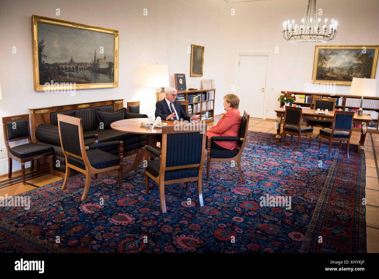 Berlin, Germany. 20th Nov, 2017. HANDOUT - Chancellor Angela Merkel and President Frank-Walter Steinmeier of Germany converse at the begin of their meeting at Bellevue castle in Berlin, Germany, 20 November 2017. Previously, Chancellor Merkel informed the President about the situation after the failed exploratory talks.(ATTENTION EDITORS: FOR EDITORIAL USE ONLY IN CONNECTION WITH CURRENT REPORTING; MANDATORY CREDIT) Credit: Guido Bergmann/Bundesregierung-Pool/dpa/Alamy Live News Stock Photo