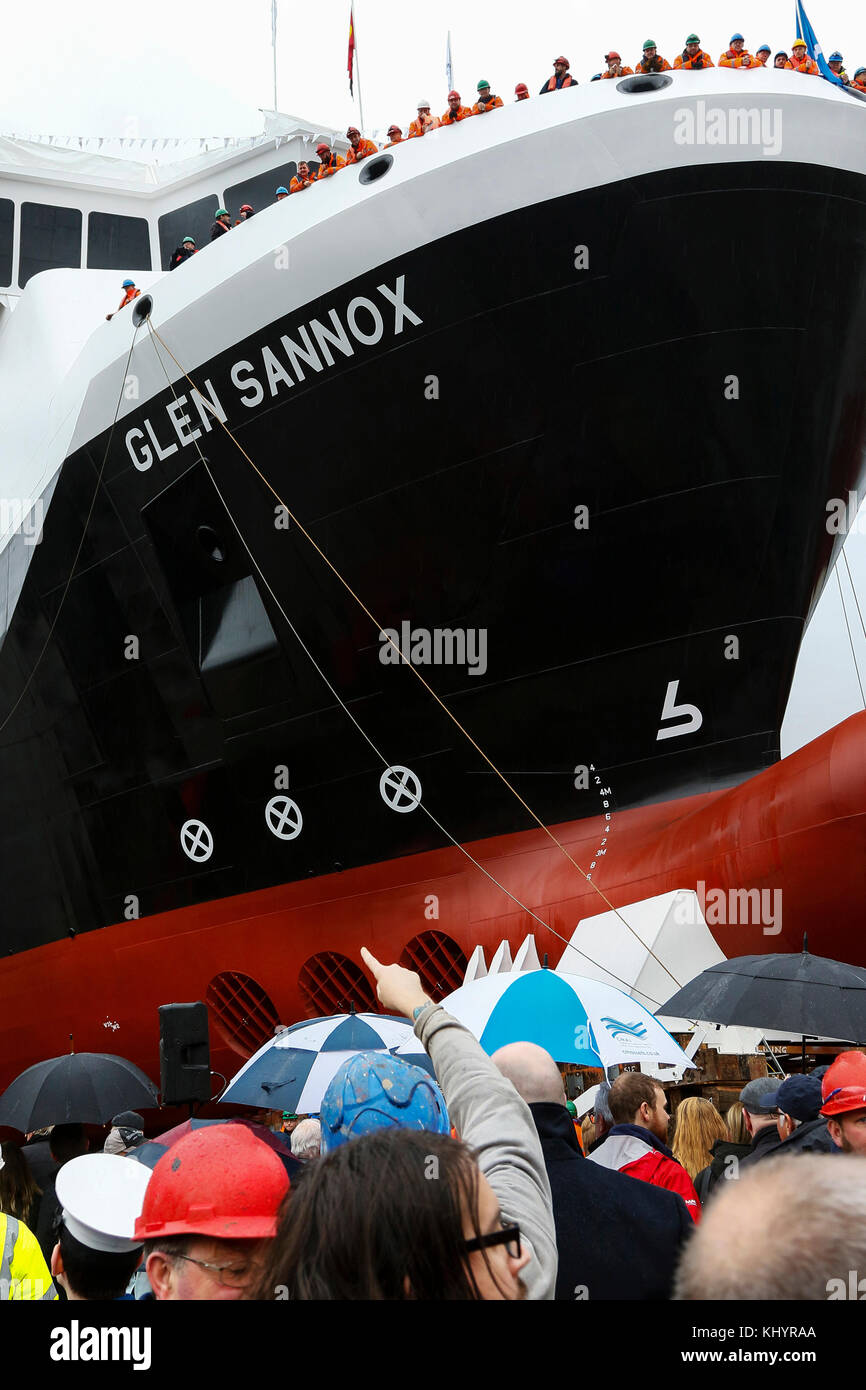 Port Glasgow, Scotland, UK. 21st Nov, 2017. Thousands of spectators turned out in heavy rain to watch NICOLA STURGEON, First Minister of Scotland launch the MV Glen Sannox from the slipway of Ferguson's Shipyard, Port Glasgow. Ferguson's yard was almost in administration in August 2014 losing more than 70 jobs but was rescued by the now Yard owner JIM McCOLL who has praised the Governments decision to order two dual-fuel vessels Credit: Findlay/Alamy Live News Stock Photo