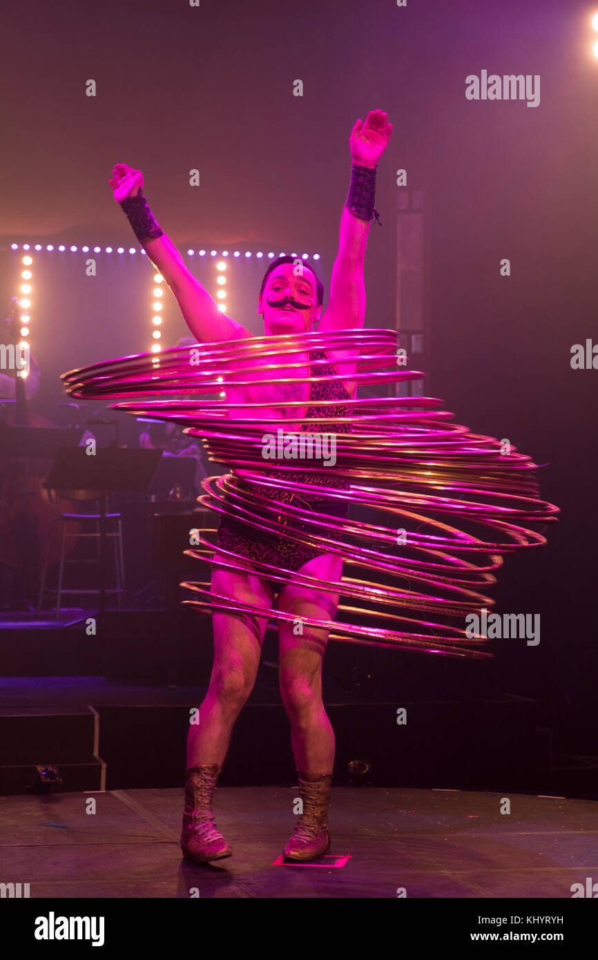 Edinburgh, Scotland, United Kingdom. , . Cabaret group La Clique present their Christmas show La Clique Noel at the Spiegeltent in Edinburgh as part of the city's annual Christmas festivities. Craig Reid performs with his Hula Hoops. Credit: Iain Masterton/Alamy Live News Stock Photo