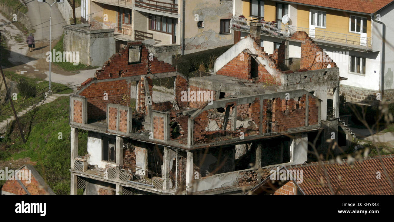 The photo shows a view over Srebrenica with destroyed houses, Bosnia and Herzegovina, 15 November 2006. Srebrenica is located at the border to Serbia. The city's number of inhabitants went down to 21,000, mostly Serbs and Serbian refugees from the Bosnian-Croatian Federation. The city set the sad scene for the massacre in July 1995, when Bosnian Serbs under the commando of General Ratko Mladic invaded the city and slaughtered all male persons they could get hold of under the eyes of Dutch UN troops. Photo: Matthias Schrader | usage worldwide Stock Photo