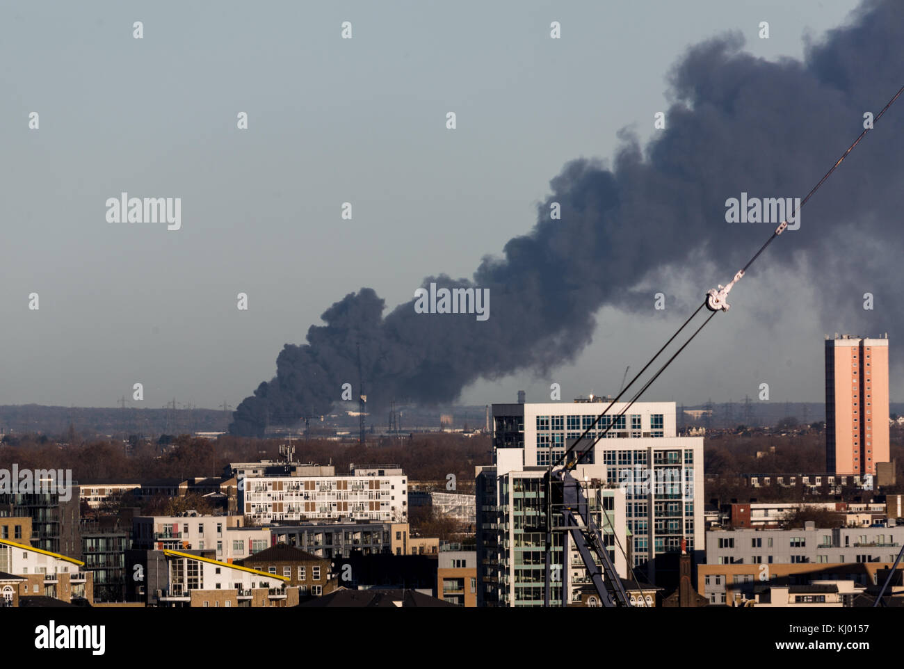 London, UK. 23th Nov, 2017. Black smoke rises from a warehouse fire in Ponders End, Enfield. Seen from south east London. Currently 12 fire engines and 81 firefighters are tackling the blaze. Credit: Guy Corbishley/Alamy Live News Stock Photo