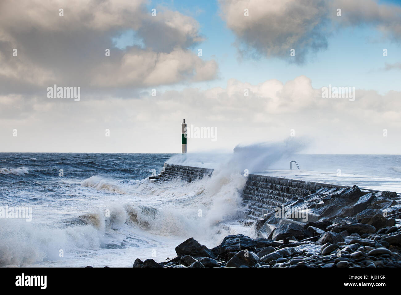 Aberystwyth, Ceredigion, UK. 23rd Nov, 2017. UK Weather. For a second day of high winds and heavy weather, large waves hit the sea defences at Aberystwyth, mid Wales. Stock Photo