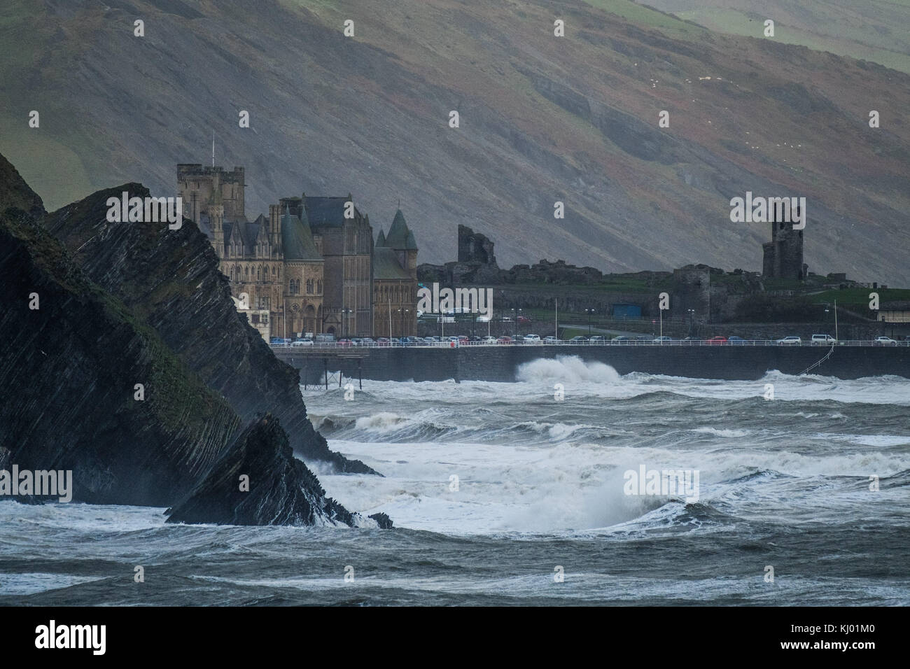 Aberystwyth Wales UK, Thursday 23 November 2017 UK Weather: High tides and very strong winds combine to bring waves crashing into the castle headland and university buildings on the promenade in Aberystwyth, on the Cardigan Bay coast of west wales. photo Credit: Keith Morris/Alamy Live News Stock Photo
