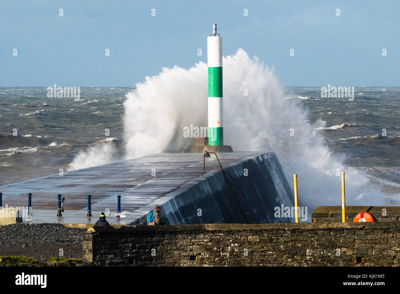 Aberystwyth Wales UK, Thursday 23 November 2017 UK Weather: High tides and very strong winds combine to bring waves crashing into the sea defences and promenade in Aberystwyth, on the Cardigan Bay coast of west wales. photo Credit: Keith Morris/Alamy Live News Stock Photo