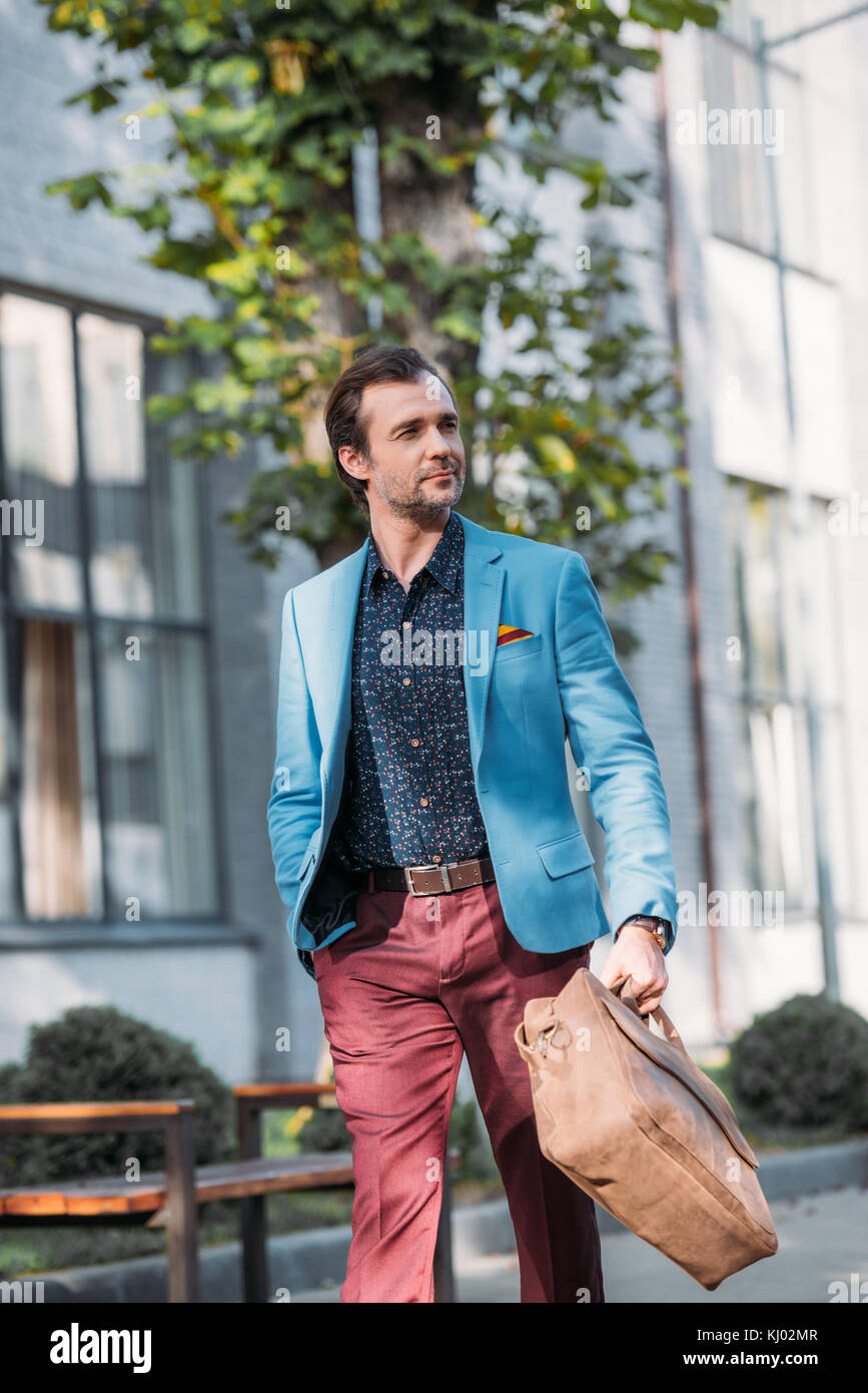 stylish man with bag Stock Photo