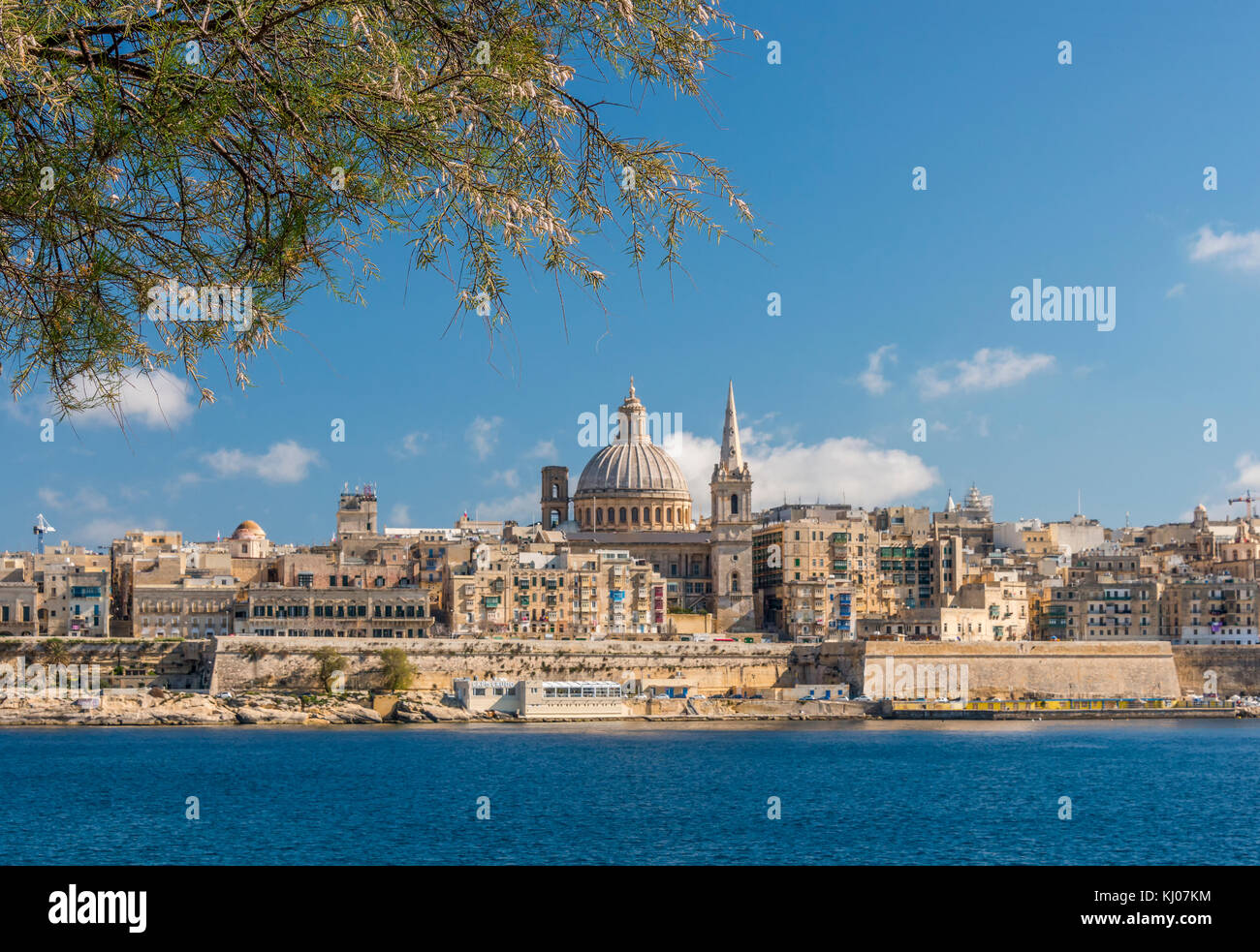 skyline of valletta in malta as viewed from acroos the water in sliema Stock Photo