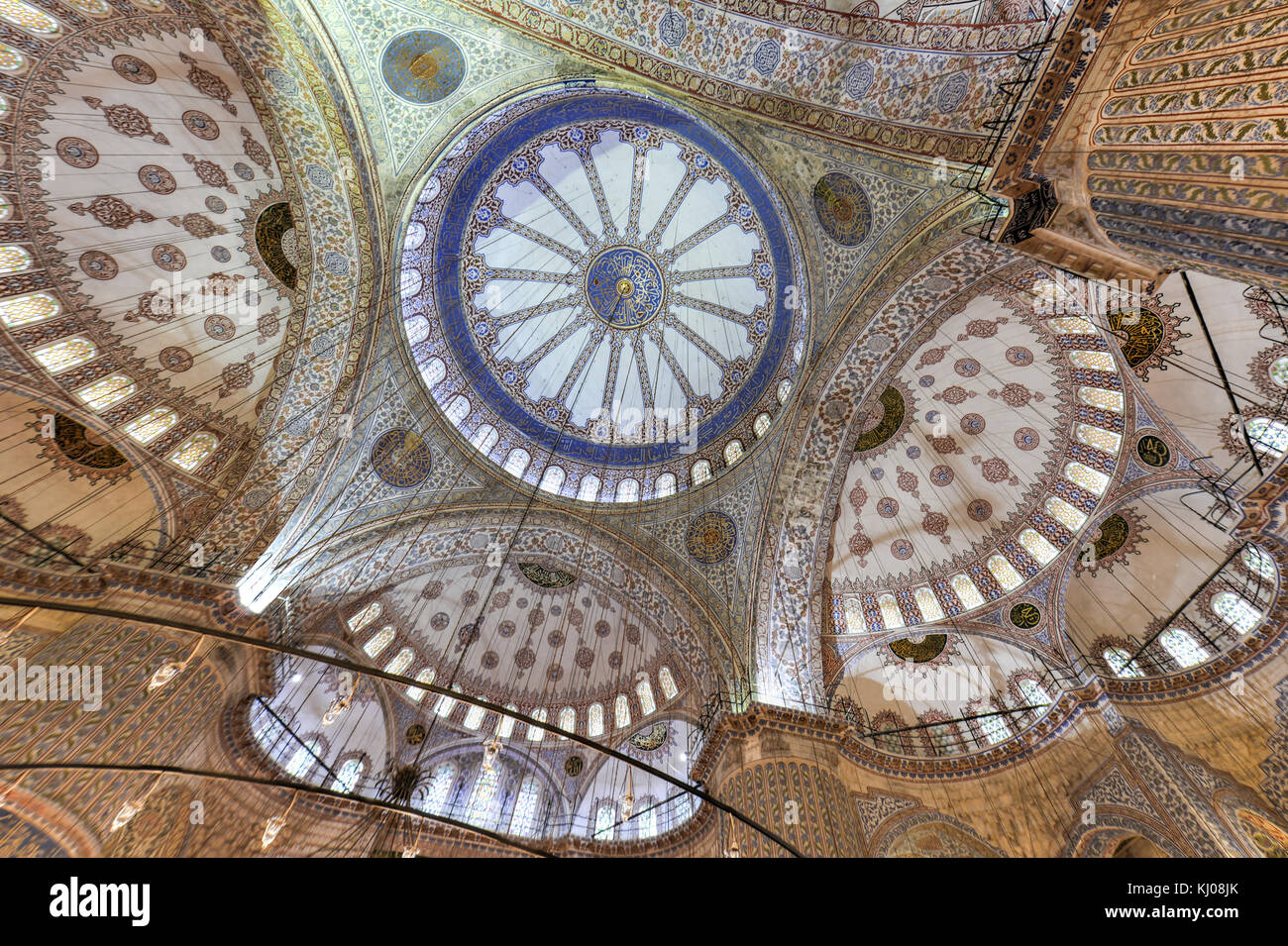 ISTANBUL, TURKEY - DECEMBER 2, 2014: Blue Mosque intricate ceiling in Istanbul. Also know as the Sultan Ahmed Mosque, it is a historic mosque in Istan Stock Photo