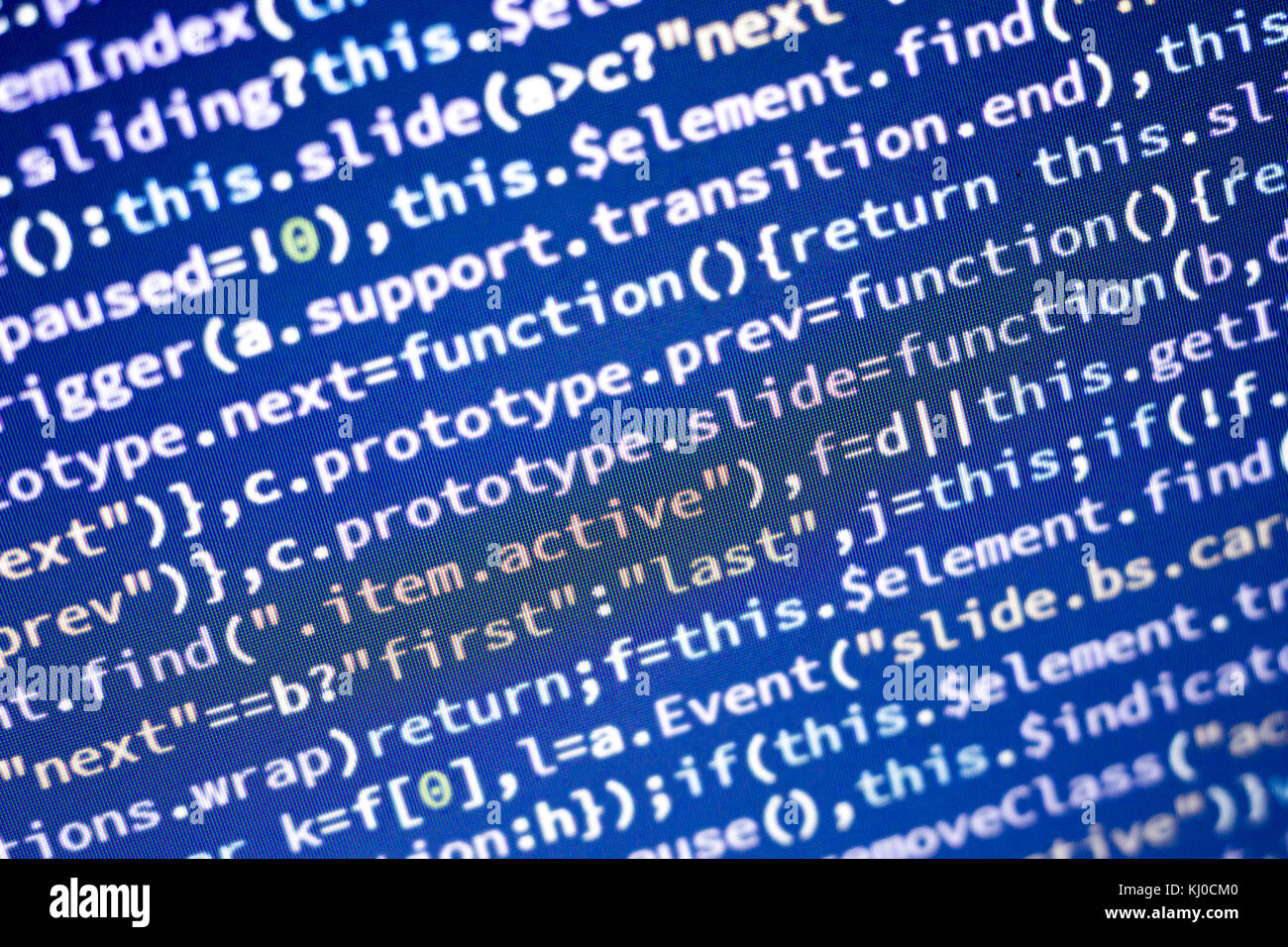 Glowing minificated javascript code. Abstract screen of modern web developer. Hacking computer network. Stock Photo