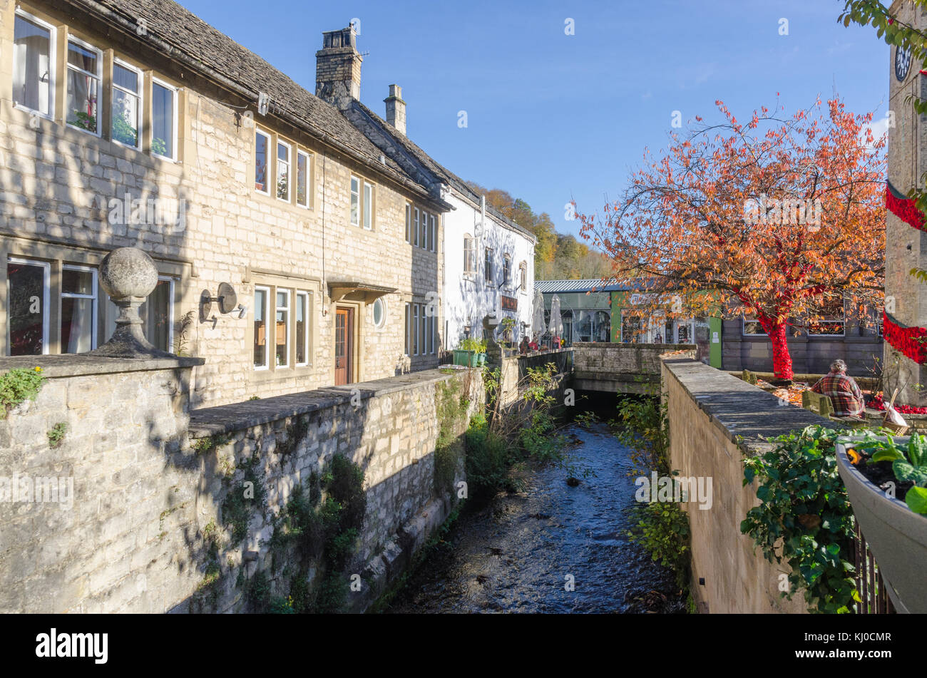 Nailsworth Stream running between Hobbs House Bakery and the Clock Tower War Memorial in the