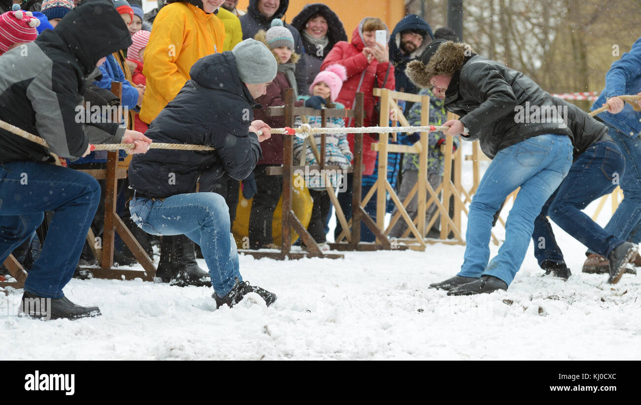 23.02.2017.Russia.Saint-Petersburg.Youth fun in dragging the rope ...