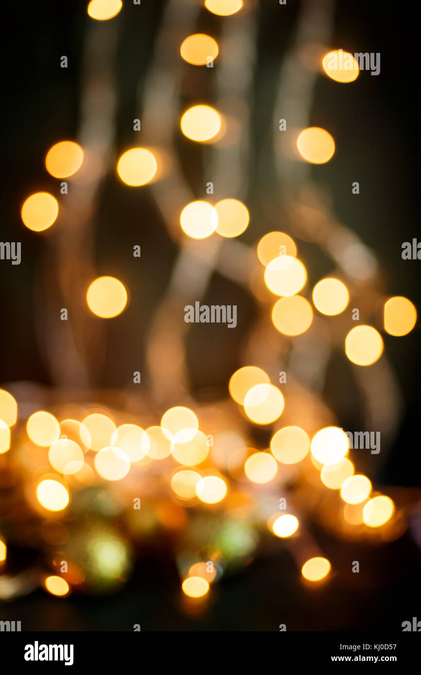 Golden lights bokeh defocus abstract background. Gold Festive Christmas ...
