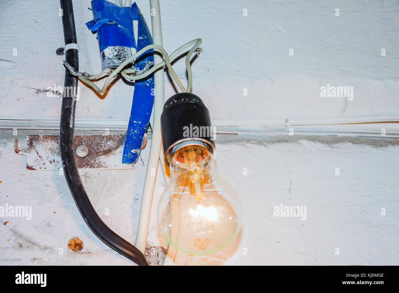 Dangerous connection to the lamp Stock Photo Alamy