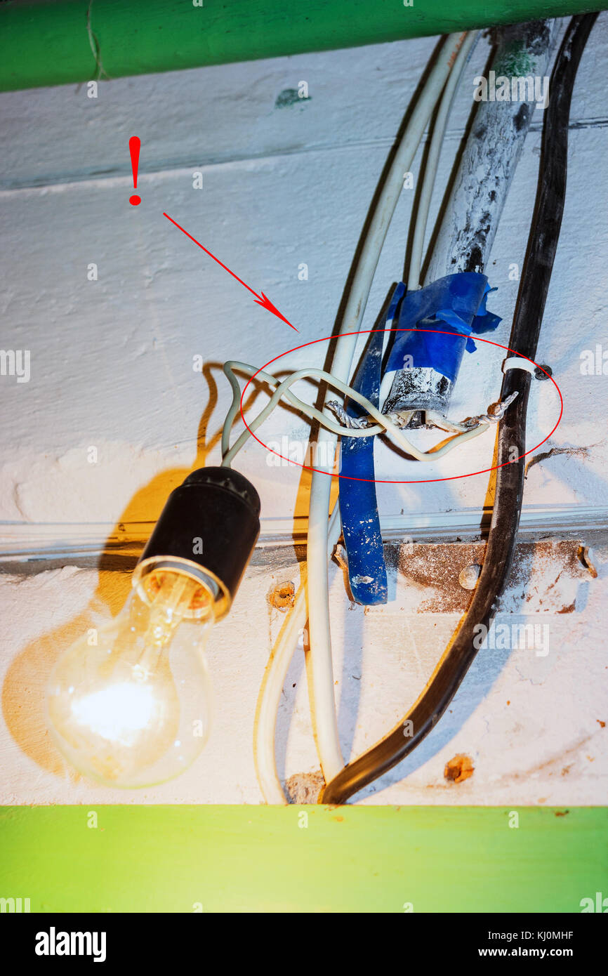 Dangerous connection to the lamp Stock Photo Alamy