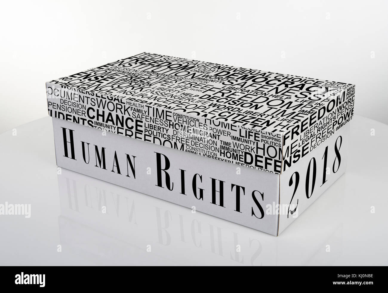 White shoe box with 2018 Human Rights words on white table with ...