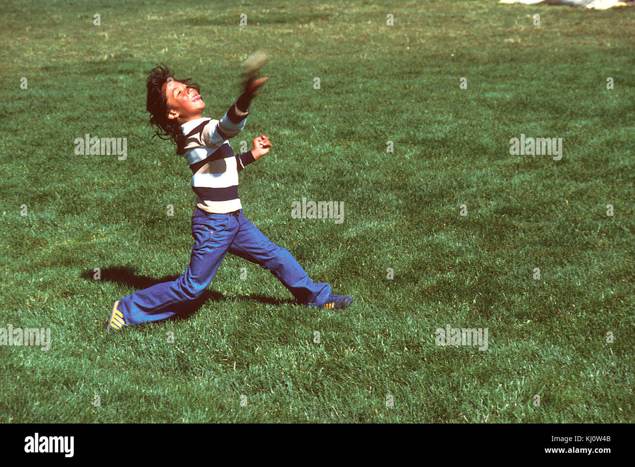 Child catching baseball Stock Photo Alamy