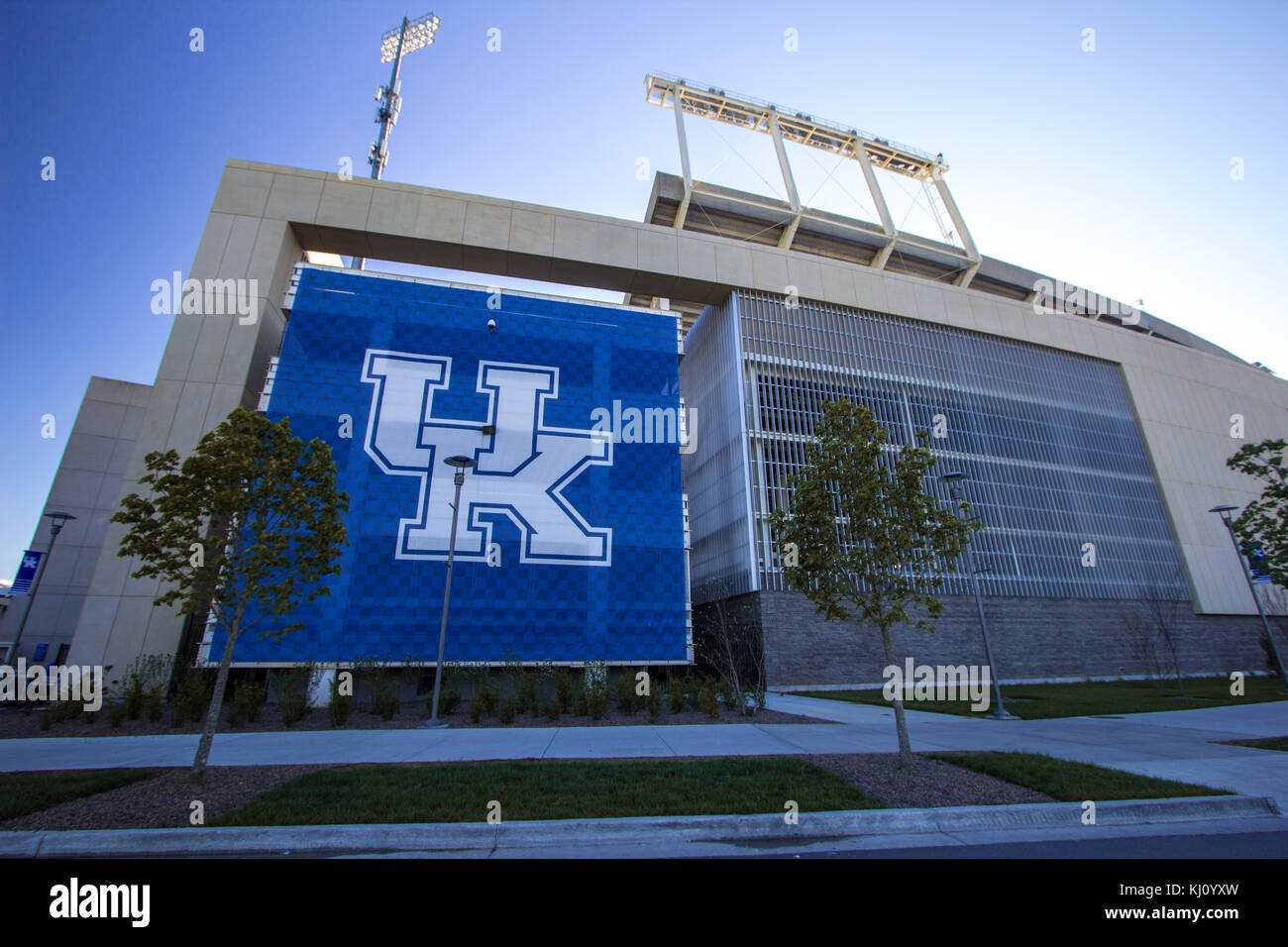 Lexington, Kentucky, USA - April 22, 2016: Exterior of the University of Kentucky Wildcats Commonweath football stadium with large U of K logo banner. Stock Photo