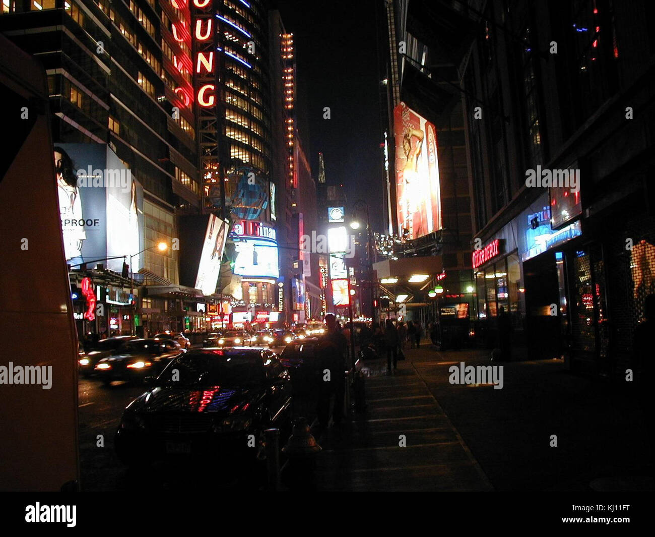 Neon and signs on buildings with busy traffic at night Stock Photo Alamy