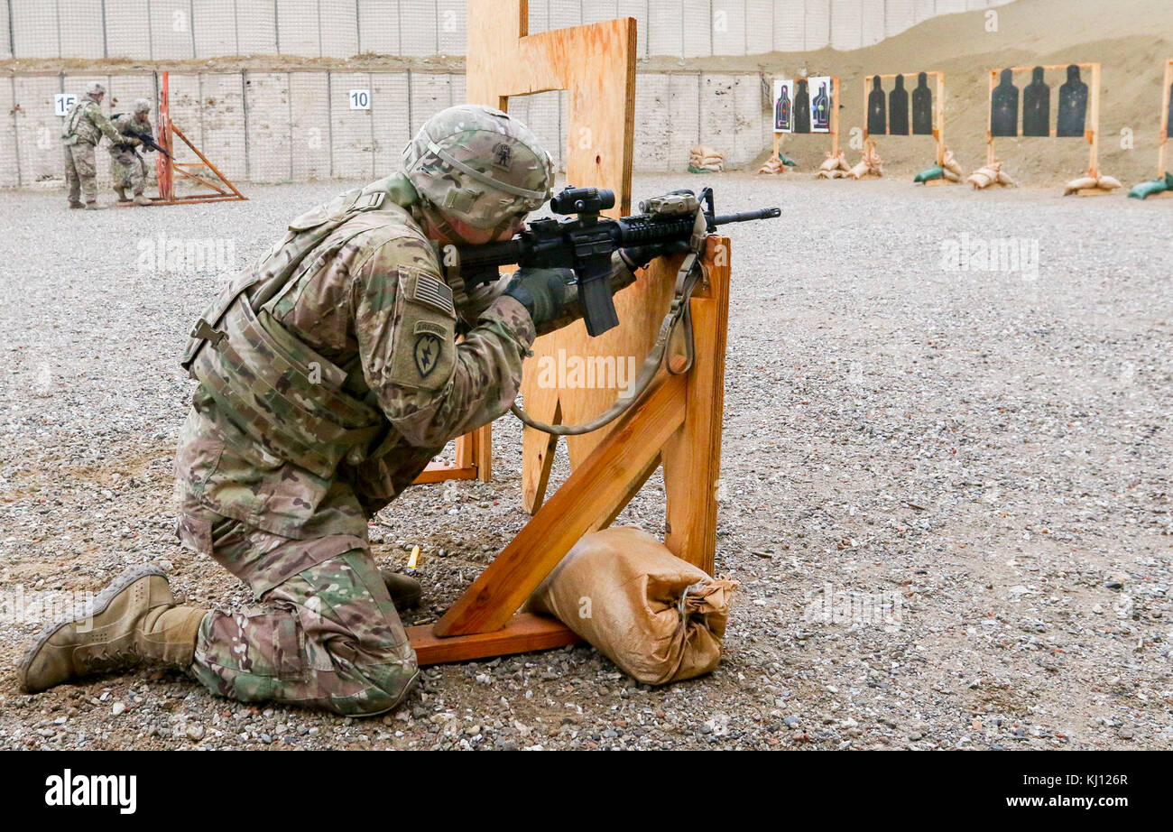 Soldiers from the 25th Infantry Division fire their M4 rifles in a marksmanship competition as part of the celebration of Marne Week Forward at Bagram Airfield, Afghanistan on Thursday, 16 November 2017.  LTG Leopoldo Quintas is the Commander of both US Forces - Afghanistan National Support Element and the 3rd Infantry Division.  The 3ID is celebrating their 100th anniversary with festivities at Ft. Stewart and at their deployed location in Afghanistan. Stock Photo