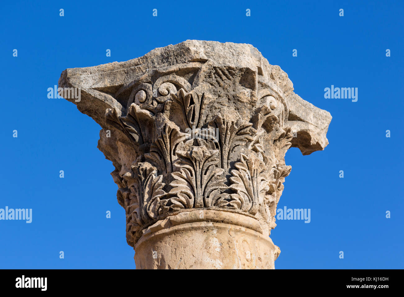 Closeup of a top of a roman column in the ruins of the old city of ...