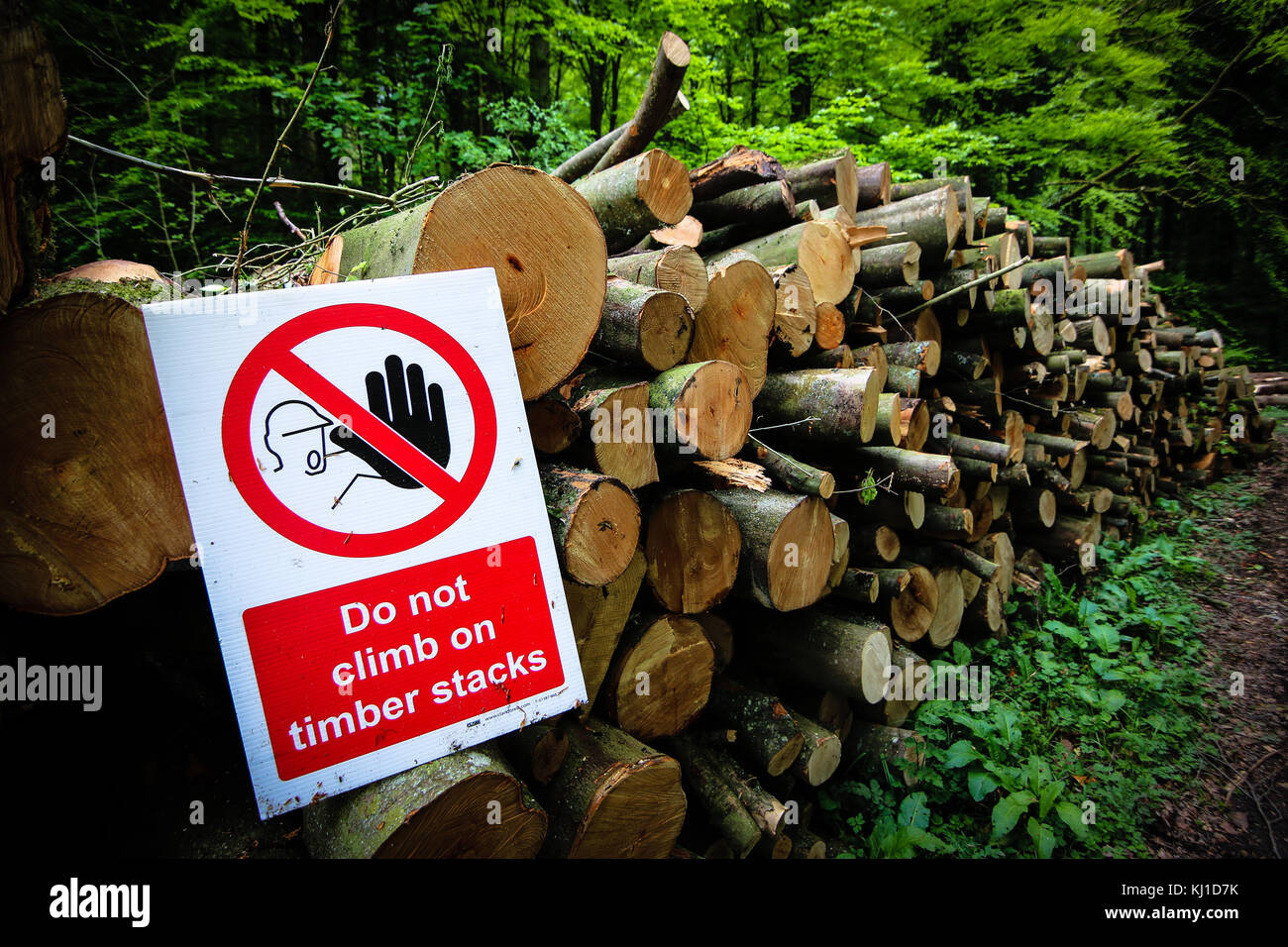 Stacked Timber Wood Warning Sign Stock Photo