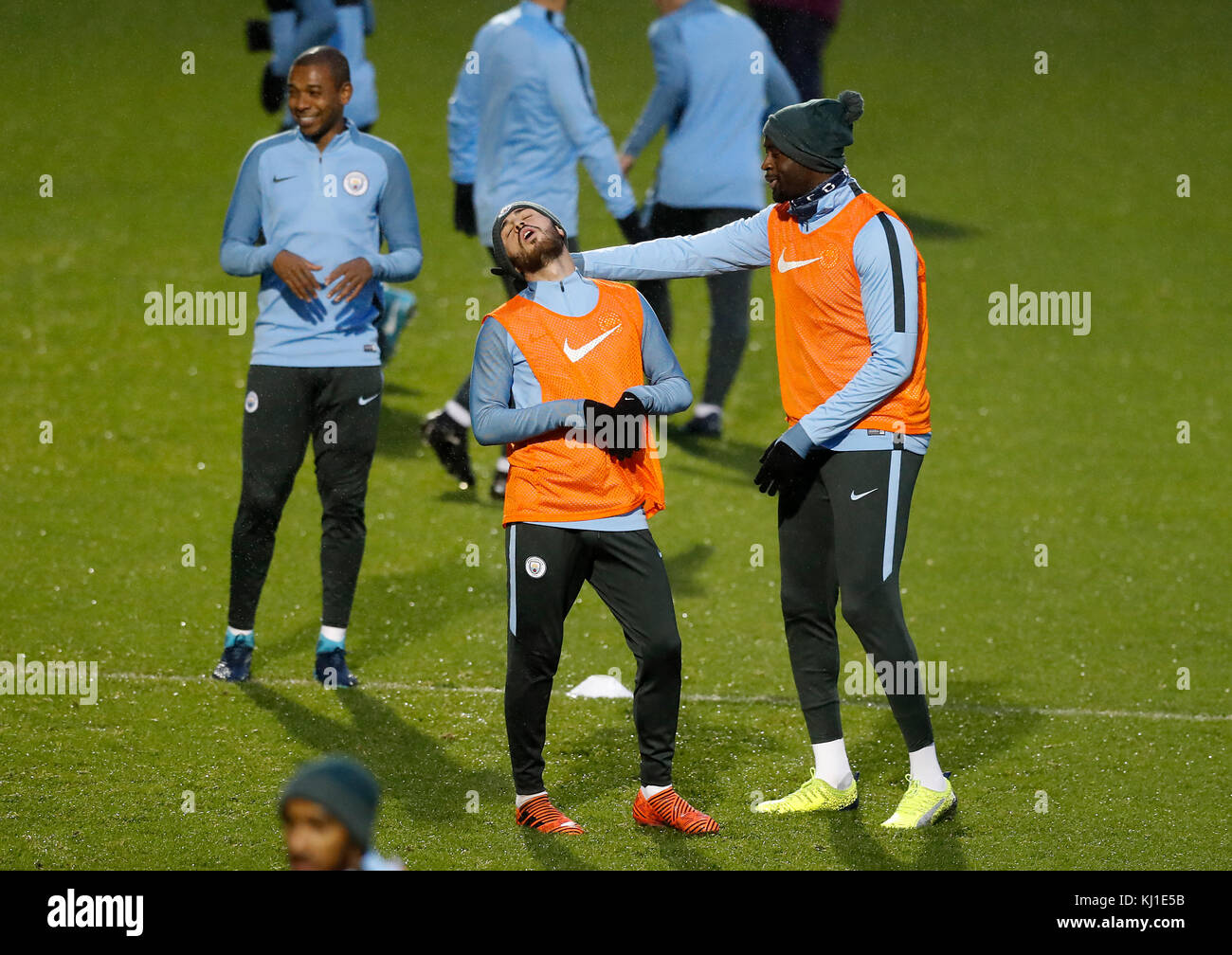 Manchester City's Bernardo Silva (centre) and Yaya Toure (right) during