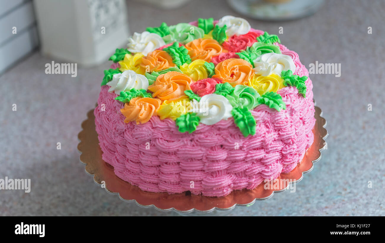 colorful cake with lattice pattern on cake stand Stock Photo Alamy