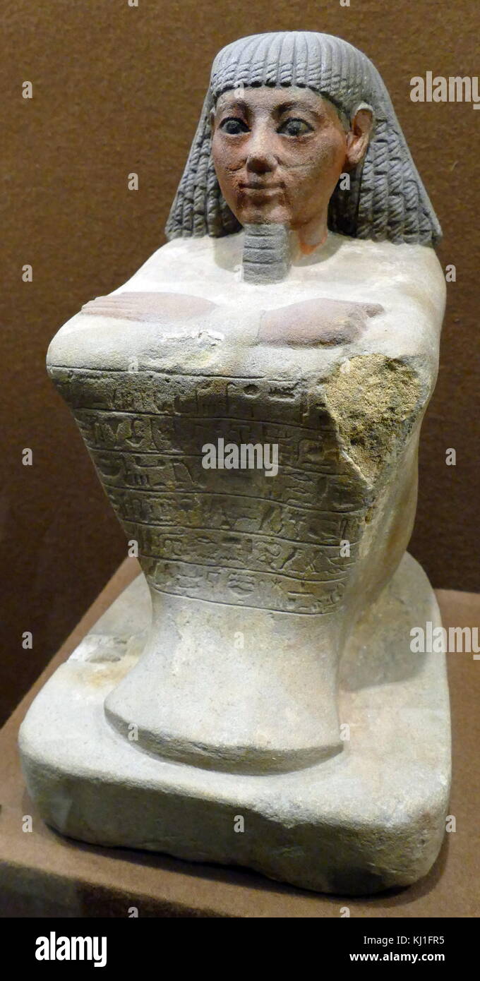 Egyptian Statue of the scribe of the Grain accounts, Maa-no-Amon, Limestone, 1500 BC Stock Photo