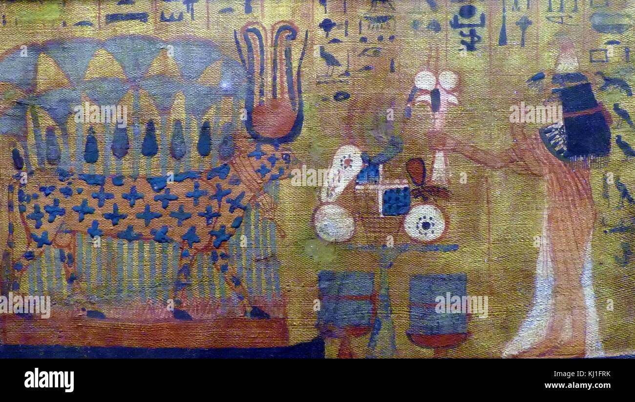 Papyrus scroll with a painted view of an ancient Egyptian Mut-em-Via; (Bringing sacrifices to the goddess Hathor in the form of a cow). Middle Kingdom Stock Photo