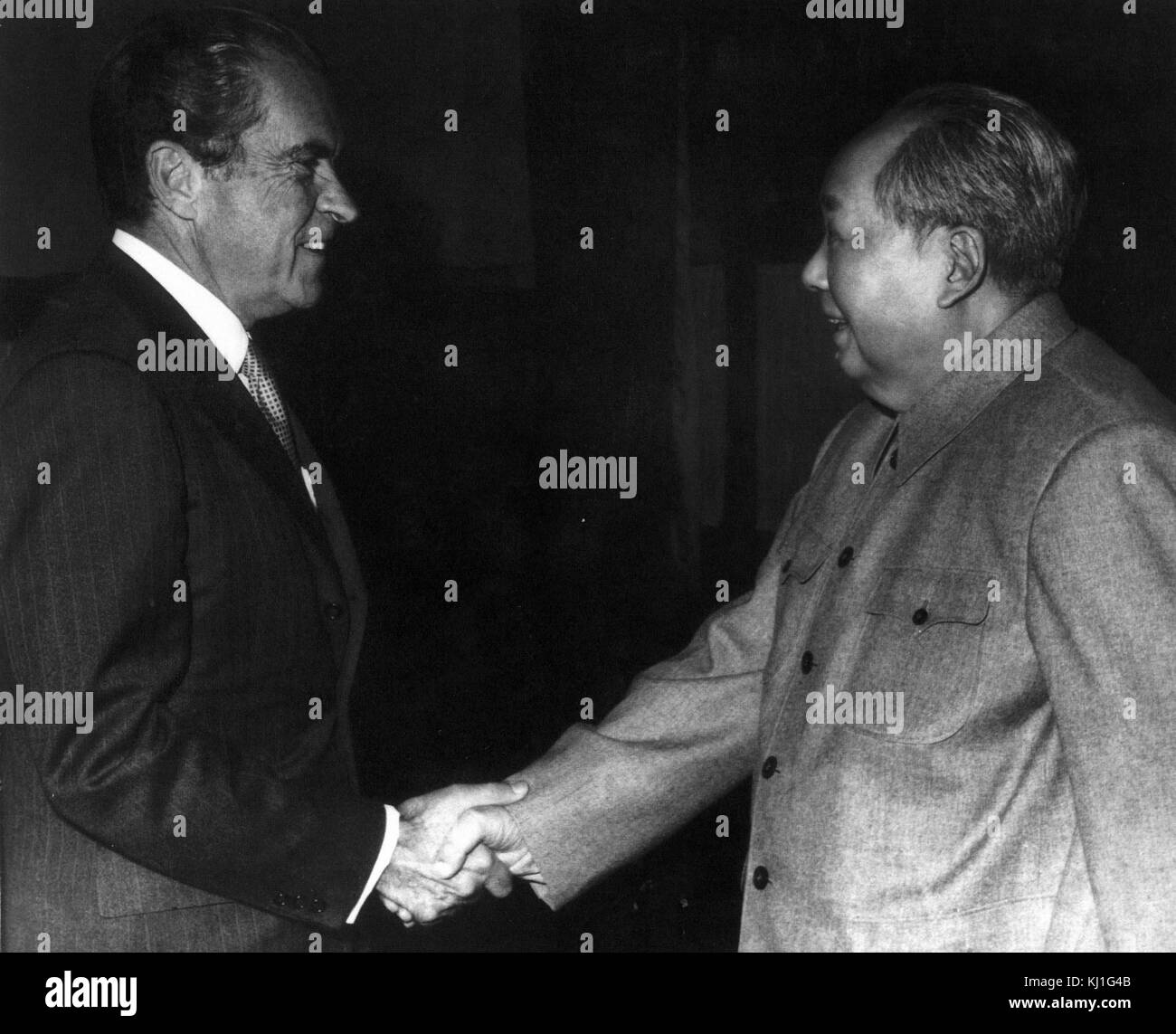 US President Richard Nixon meets Chinese Communist Party leader Chairman Mao Zedong or Mao Tse-tung (1893 – 1976), during the American President's visit to China in 1972 Stock Photo