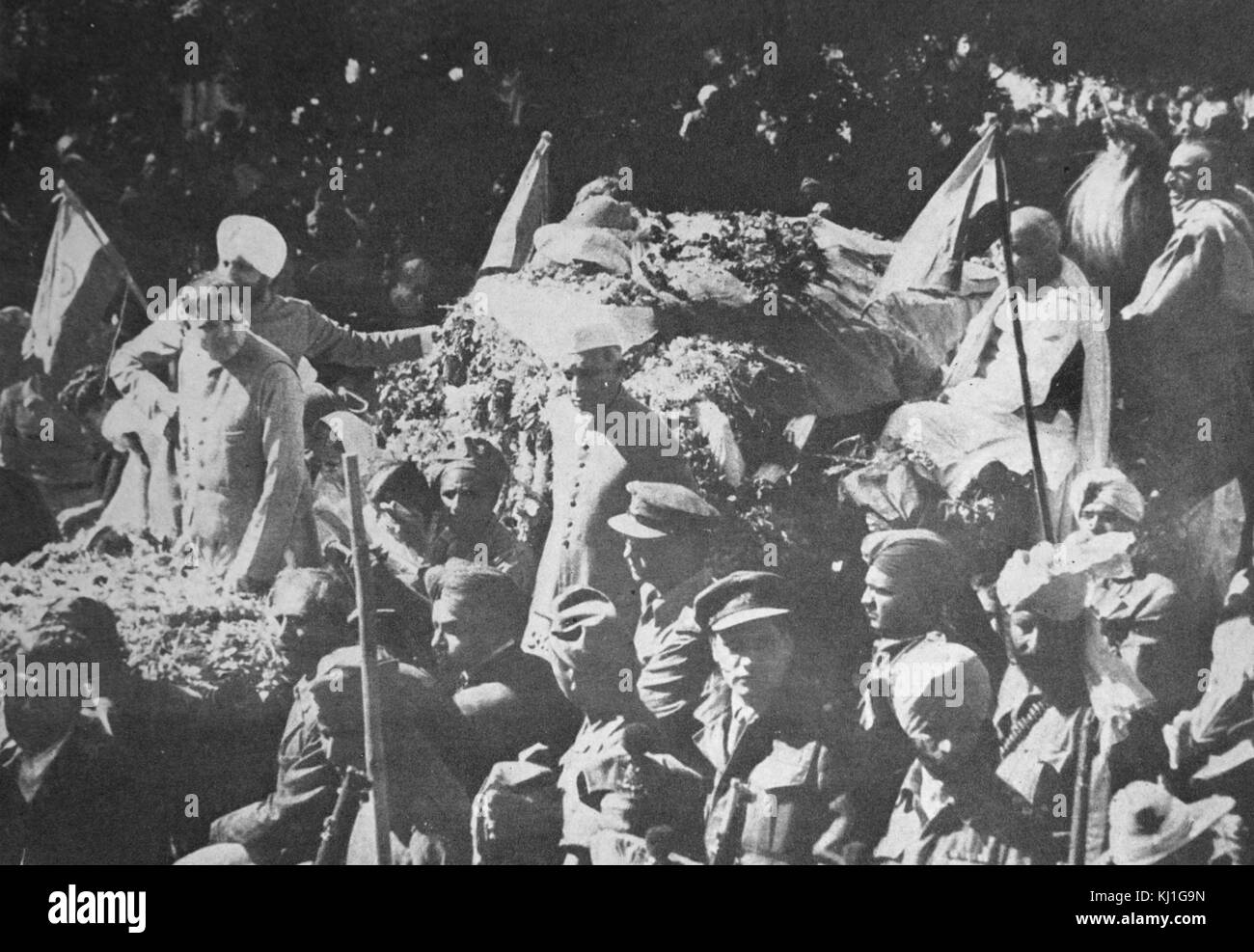 Funeral of Mohandas Karamchand Gandhi after he was assassinated in the garden of Birla House, on 30 January 1948. Gandhi (1869 – 1948), was the preeminent leader of the Indian independence movement in British-ruled India. Employing nonviolent civil disobedience, Gandhi led India to independence and inspired movements for civil rights and freedom across the world Stock Photo