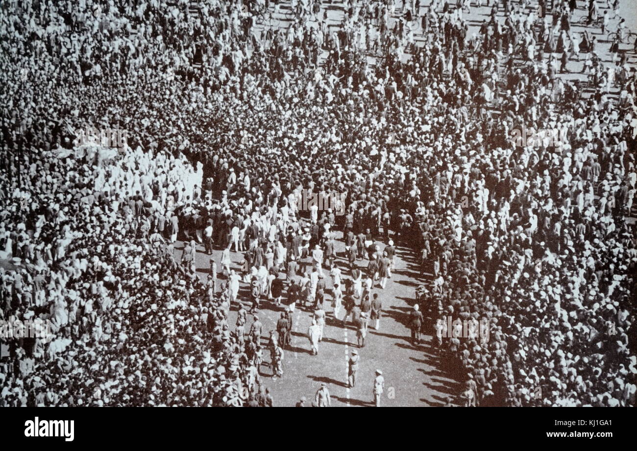 Funeral of Mohandas Karamchand Gandhi after he was assassinated in the garden of Birla House, on 30 January 1948. Gandhi (1869 – 1948), was the preeminent leader of the Indian independence movement in British-ruled India. Employing nonviolent civil disobedience, Gandhi led India to independence and inspired movements for civil rights and freedom across the world Stock Photo
