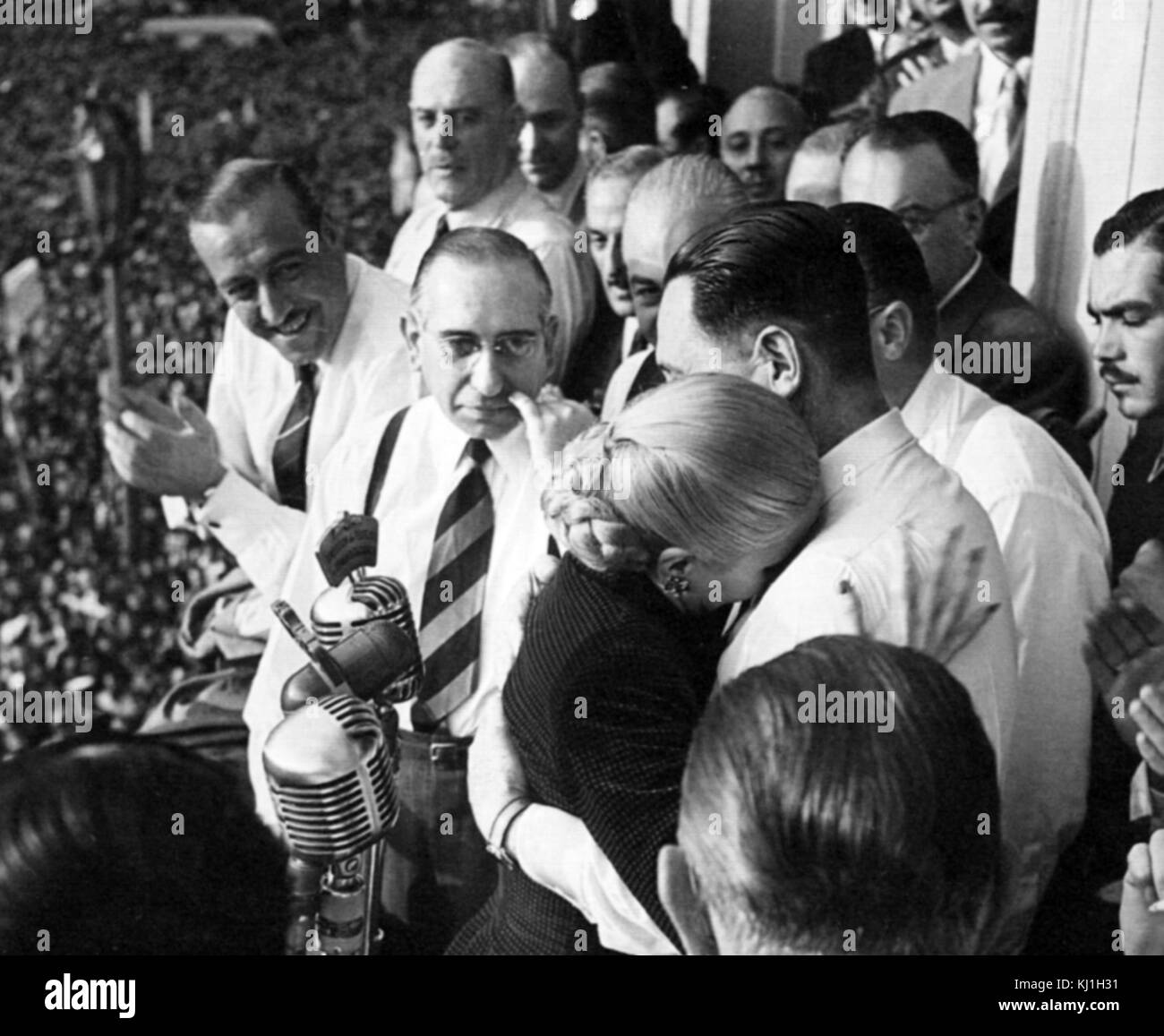 Juan Domingo Peron with his wife Evita Peron, after Evita announced to a crowd that she would not stand for office as Vice president of Argentina in 1951. Juan Peron (1895 – 1974) Argentine general and politician. He was elected President of Argentina, serving from 1946 to 1955 and from 1973 until his death in July 1974. (Evita Peron) María Eva Duarte de Peron 1919-1952), was the second wife of Argentine President Juan Peron and served as the First Lady of Argentina from 1946 until her death in 1952. Stock Photo