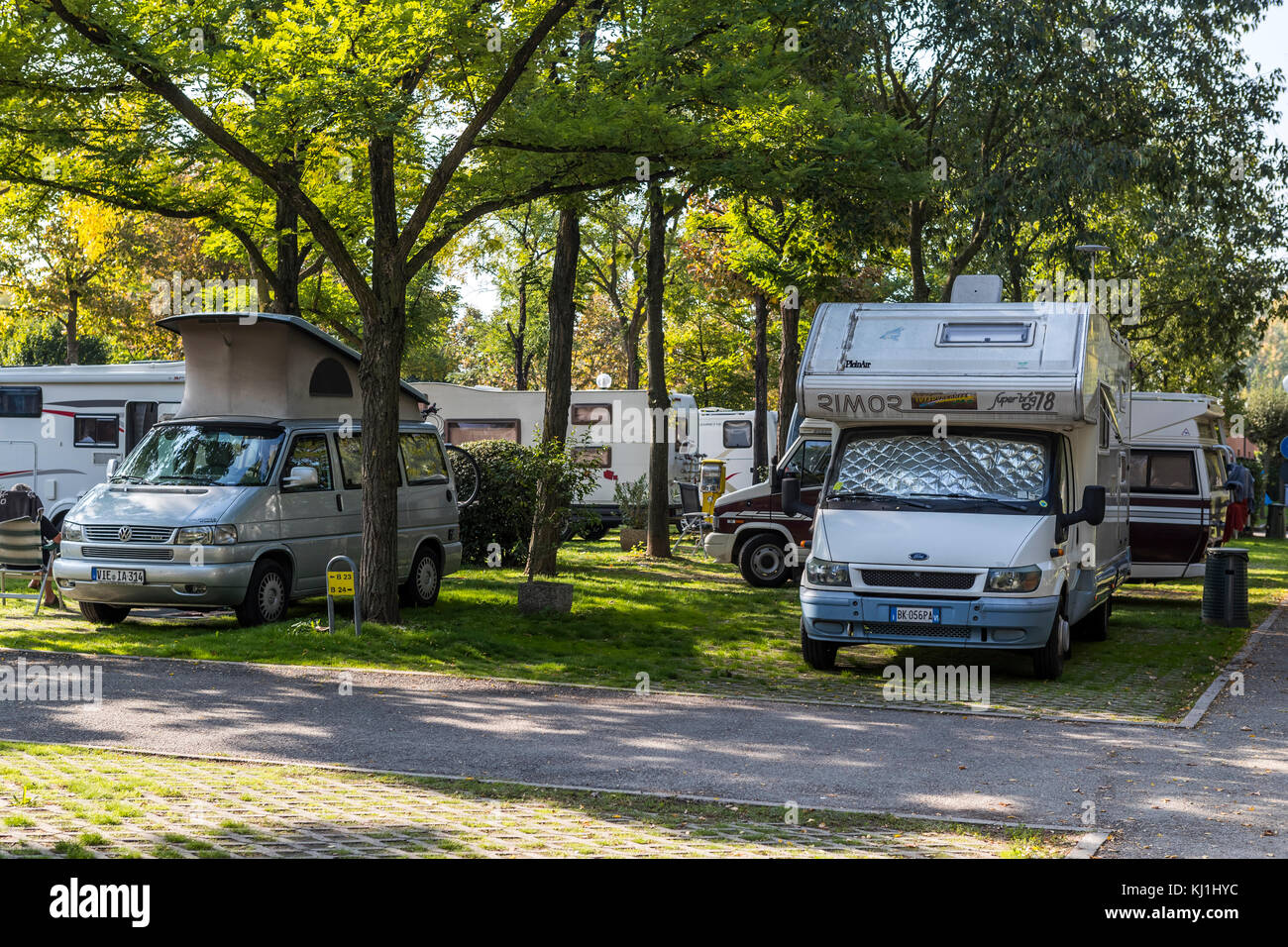 Caravans and Camper vans at Citta Di Bologna campsite. Bologna city life,  Italy Stock Photo - Alamy