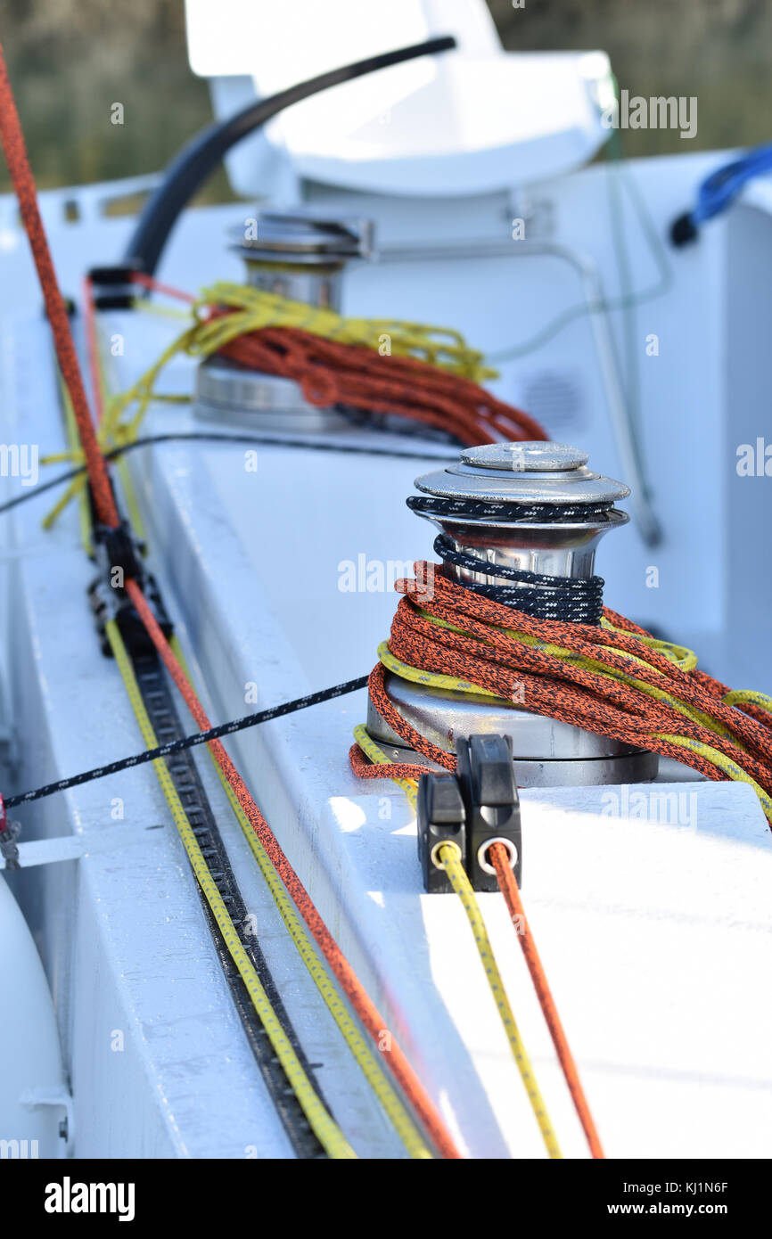 Details of winches and ropes on sailing boat racer, boating concept